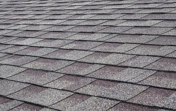 Seton tiles for shallow pitch roofing
